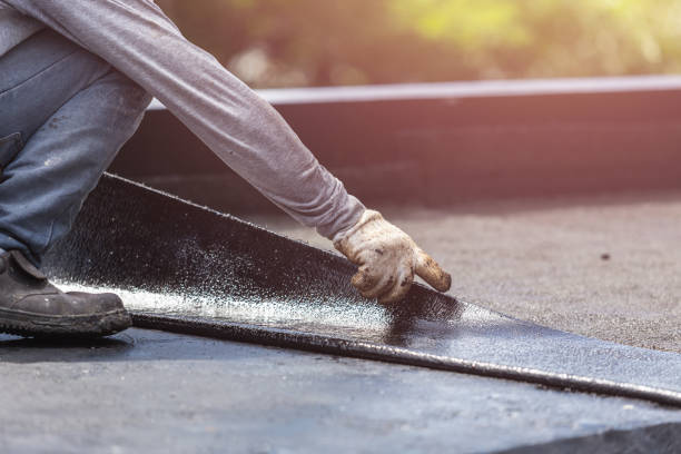 Professional Basement Waterproofing technician working in Woodbine, MD
